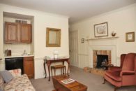 View of sitting area with fireplace.