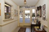 View of front door and entryway.